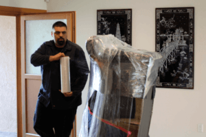 mover wrapping a couch