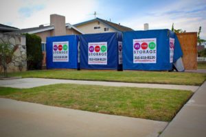 three mobile storage units on site